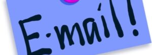 A blue sticky note with "E-mail!" boldly written in black letters and a small pink dot above the "m" serves as a vibrant reminder of communication. Perfect for sparking creativity in email marketing efforts!