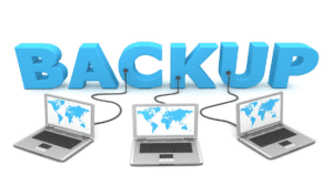 Three laptops with world map screens connect by cables to large blue 3D letters spelling "BACKUP," symbolizing top 5 data backup services.