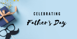 A blue gift box with a brown ribbon and yellow flowers rests on a light blue background, exuding perfect Father's Day ideas. Nearby are black paper glasses and a mustache stick, while the words "Celebrating Father's Day" stand out brightly.