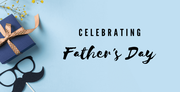 A blue gift box with a brown ribbon and yellow flowers rests on a light blue background, exuding perfect Father's Day ideas. Nearby are black paper glasses and a mustache stick, while the words "Celebrating Father's Day" stand out brightly.